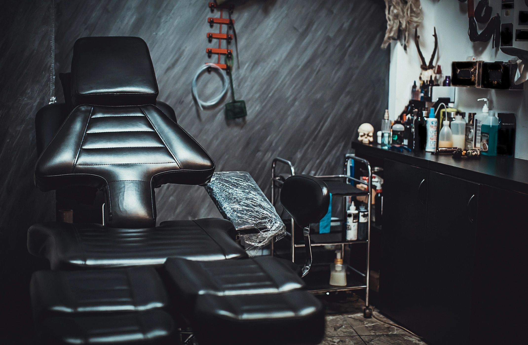 black and gray tattoo artist studio